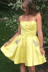 Short A-line Strapless White Beaded Homecoming Dress with Pockets