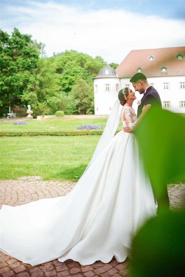 Elegant Garden A-line Sweetheart Long Sleeves Chapel Train Satin Wedding Dress