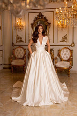 Charming Ivory Long A-line V-neck Satin Wedding Dress with Pockets