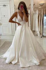 Long V-neck Spaghetti Straps A-Line Backless Wedding Dress With Pockets