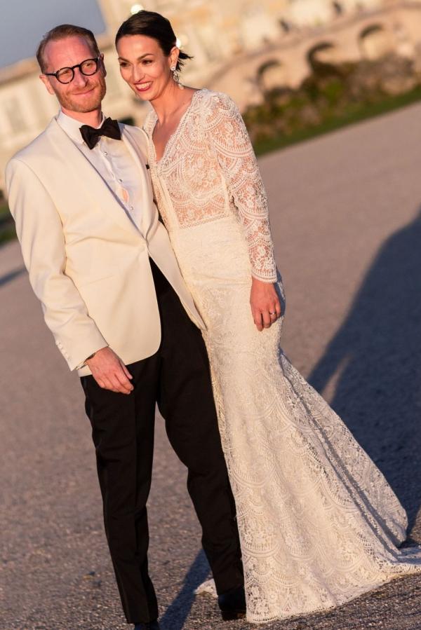 Long Sleeve Lace V-Neck Mermaid Wedding Dress with Open Back